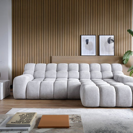 Campile sofa with electrically adjustable seat