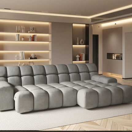 Campile sofa with electrically adjustable seat